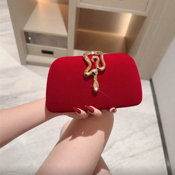 Elegant Red Clutch with Gold Snake Design  Accent